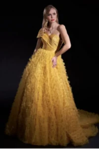 Woman in a ruffled gown styling one of the latest dresses for women