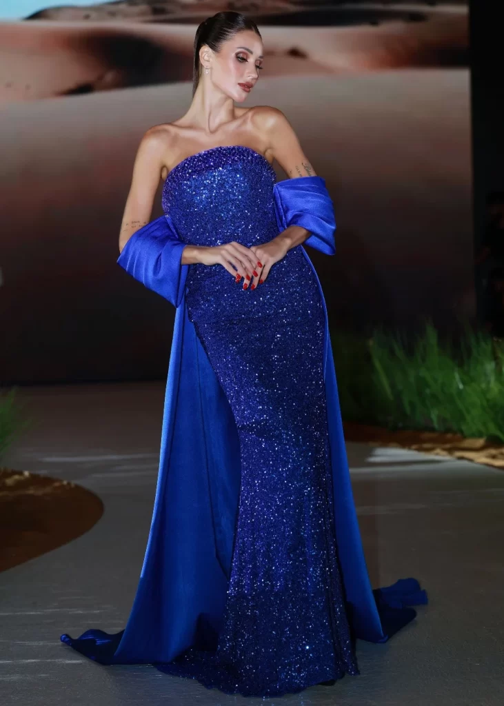 elegant model dressed in beautiful blue dress